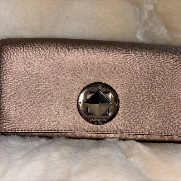 kate spade Handbags - Kate Spade Elegant Metallic Leather Clutch - EUC